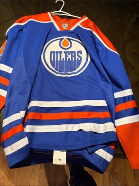 CCM Blue and Orange NHL Hockey Jersey with White Accents
